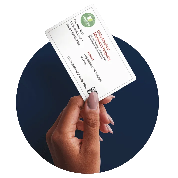 Hand holding an Ohio medical marijuana card issued through the state patient registry