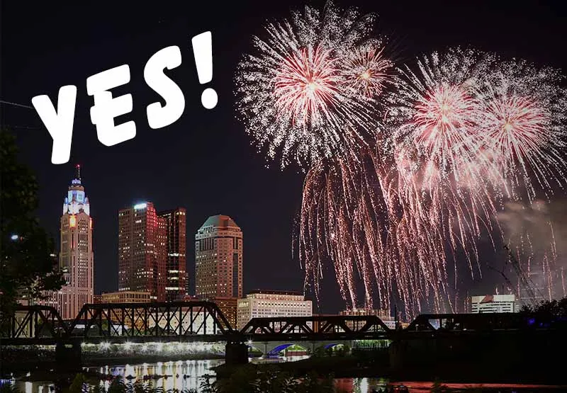 Fireworks over the Columbus, Ohio skyline at night with the word YES, celebrating Ohio's vote to legalize recreational marijuana