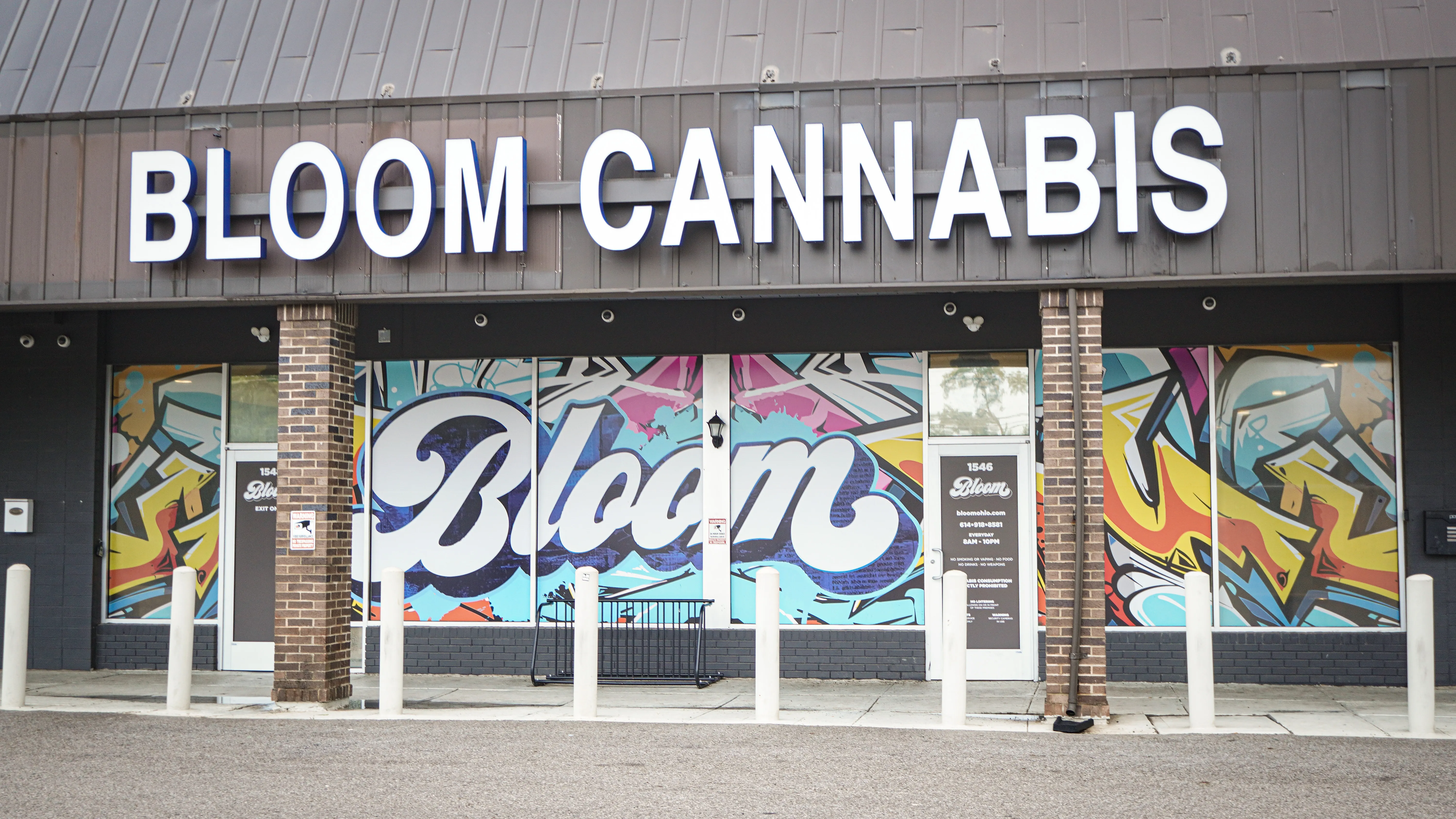 Bloom Cannabis dispensary on Lockbourne Road in South Columbus, Ohio, with the Bloom Cannabis sign above a colorful Bloom mural across the storefront windows.